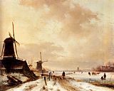 Andreas Schelfhout Winter a huntsman passing woodmills on a snowy track, skaters on a frozen river beyond painting